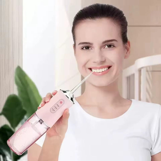 IRRIGADOR DENTAL PORTATIL